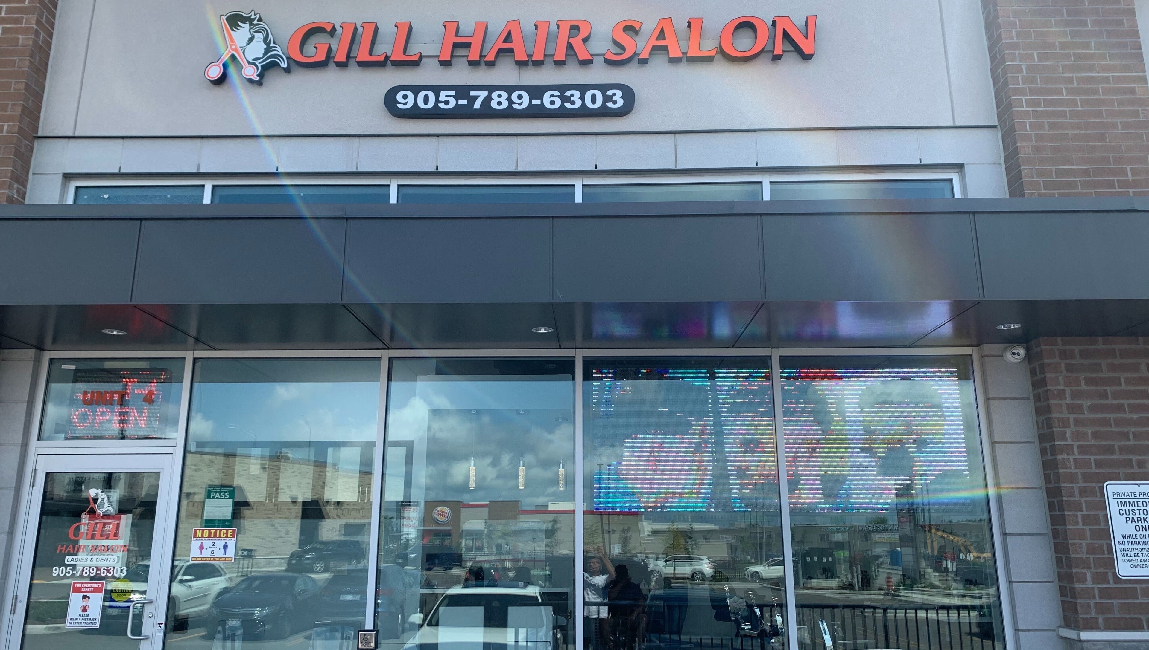 Exterior of Gill Hair Salon at 9 Beaumaris, Brampton, Ontario, CA featuring a stylish modern facade.