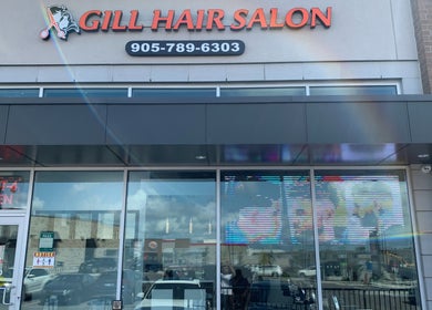 Exterior of Gill Hair Salon at 9 Beaumaris, Brampton, Ontario, CA featuring a stylish modern facade.