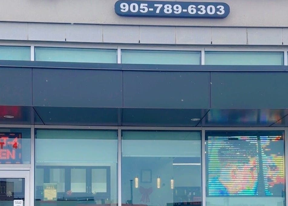 Exterior view of Gill Hair Salon, 9 Beaumaris, Brampton, showing the modern front entrance in Brampton, Ontario, CA.