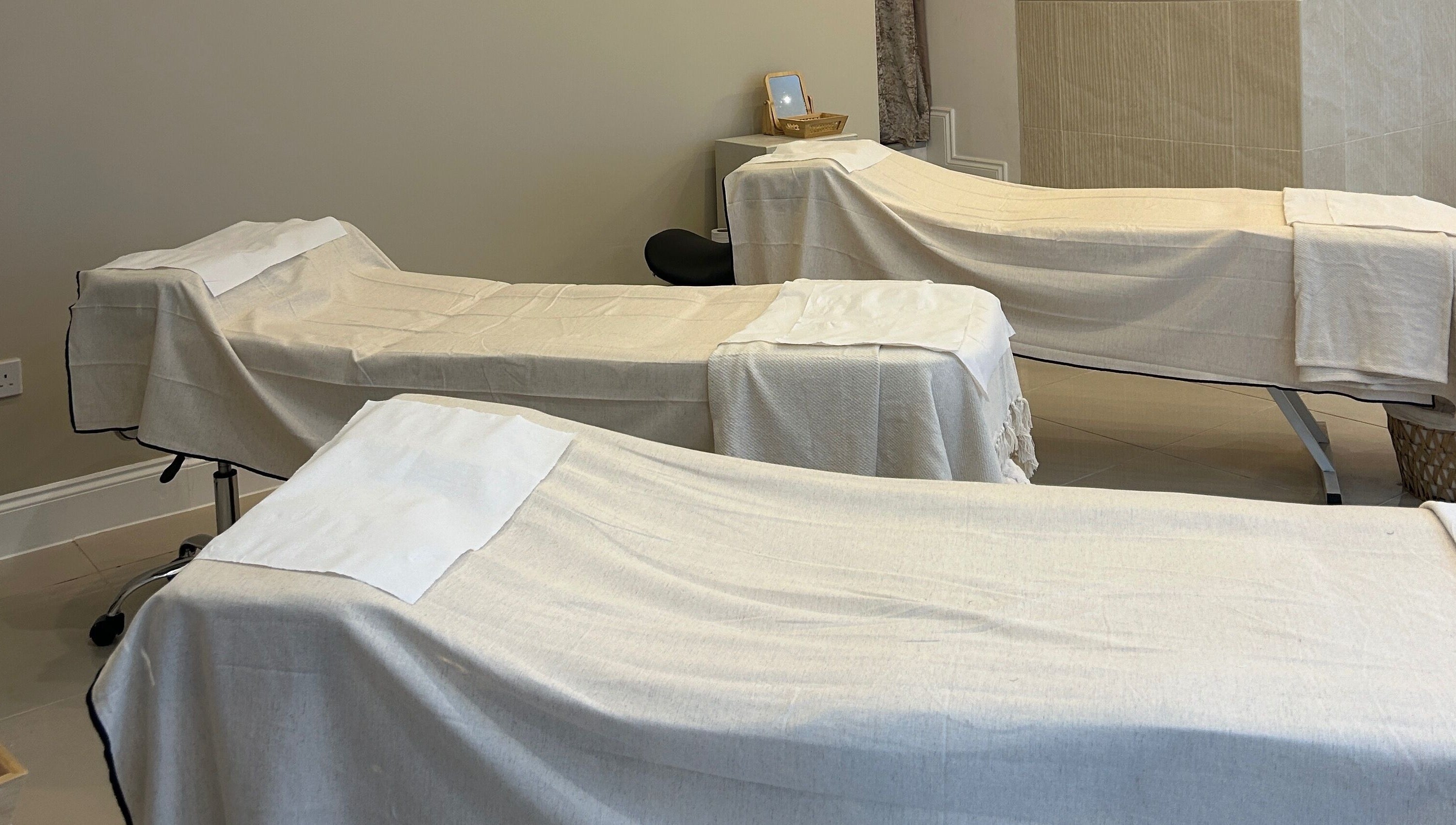 Peaceful spa treatment beds at Ellie Glover Beauty in Lowestoft, England, GB for ultimate relaxation.