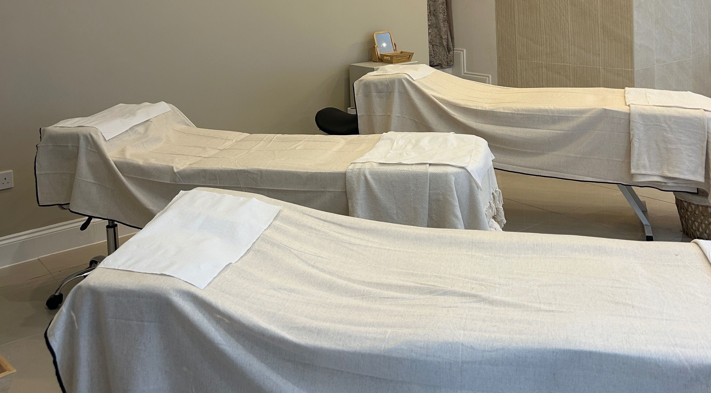 Peaceful spa treatment beds at Ellie Glover Beauty in Lowestoft, England, GB for ultimate relaxation.