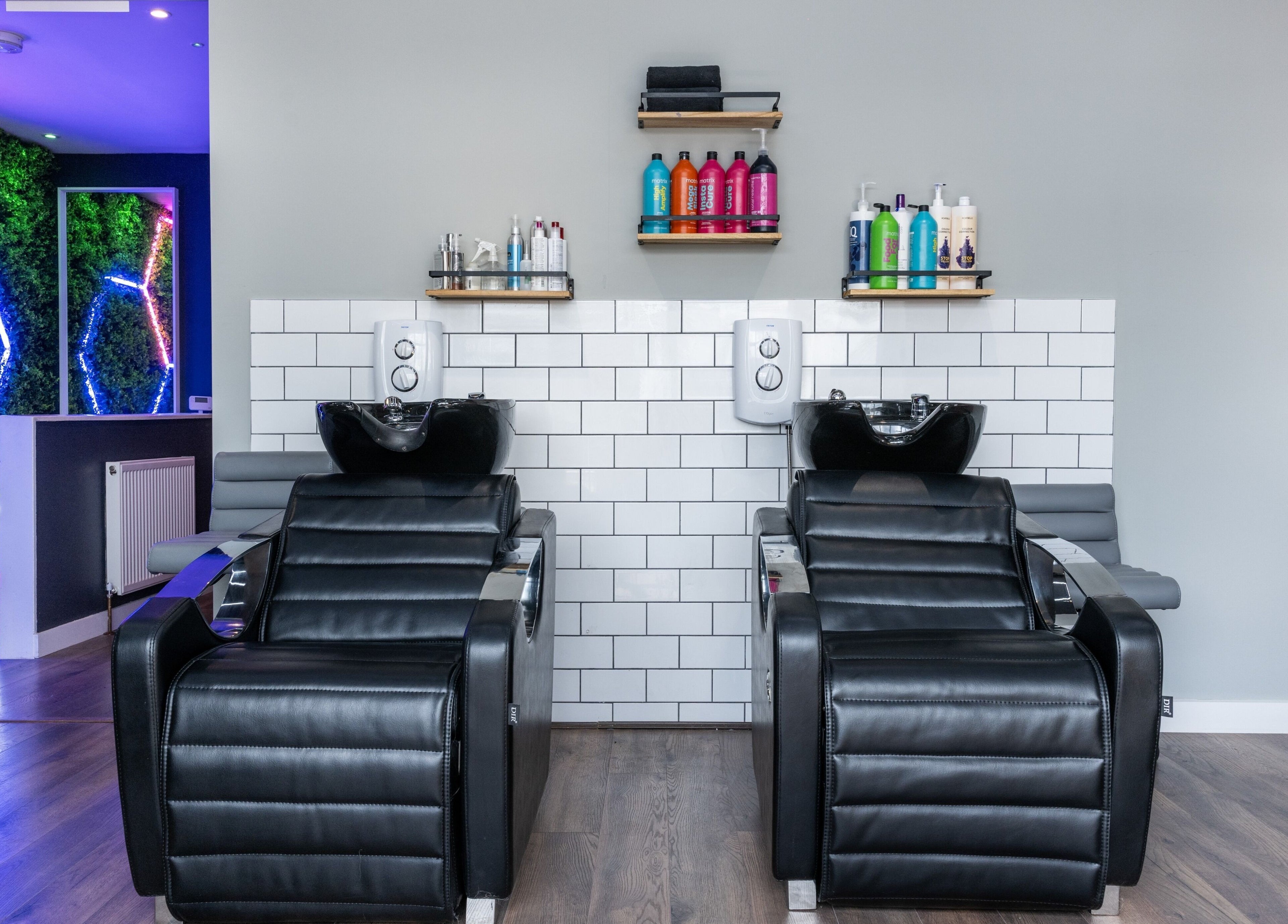 Glam Factory's sleek wash stations with vibrant decor in Nuneaton, England, GB.