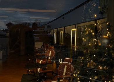 Elegant interior of Razor in the Ridge, Blue Ridge, Georgia, with warm lighting and festive decor.