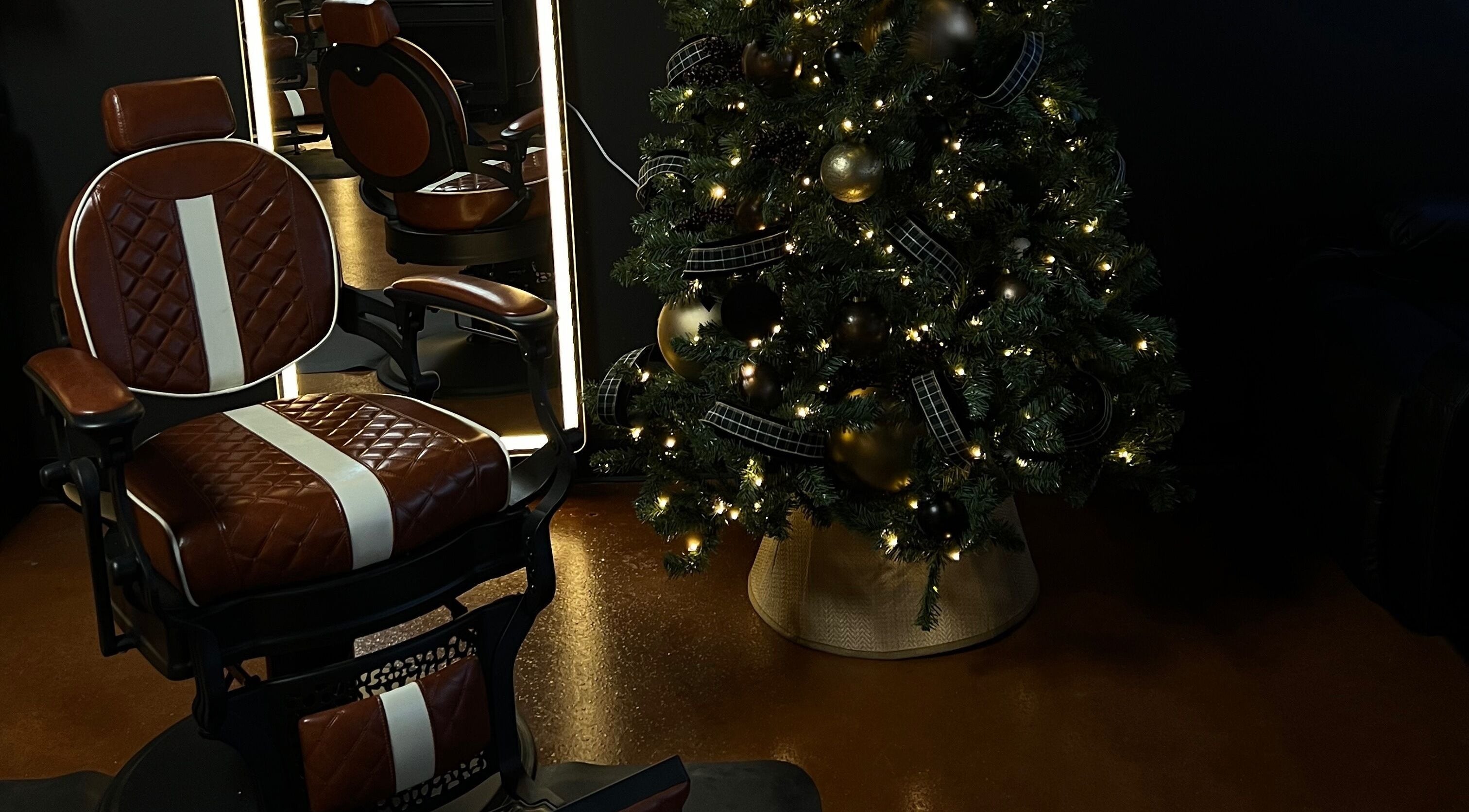 Luxurious barber chair and decorated tree at Razor in the Ridge, Blue Ridge, Georgia, US.