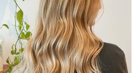 Lush blonde waves styled at Carly Jones salon in Victoria, British Columbia, CA.