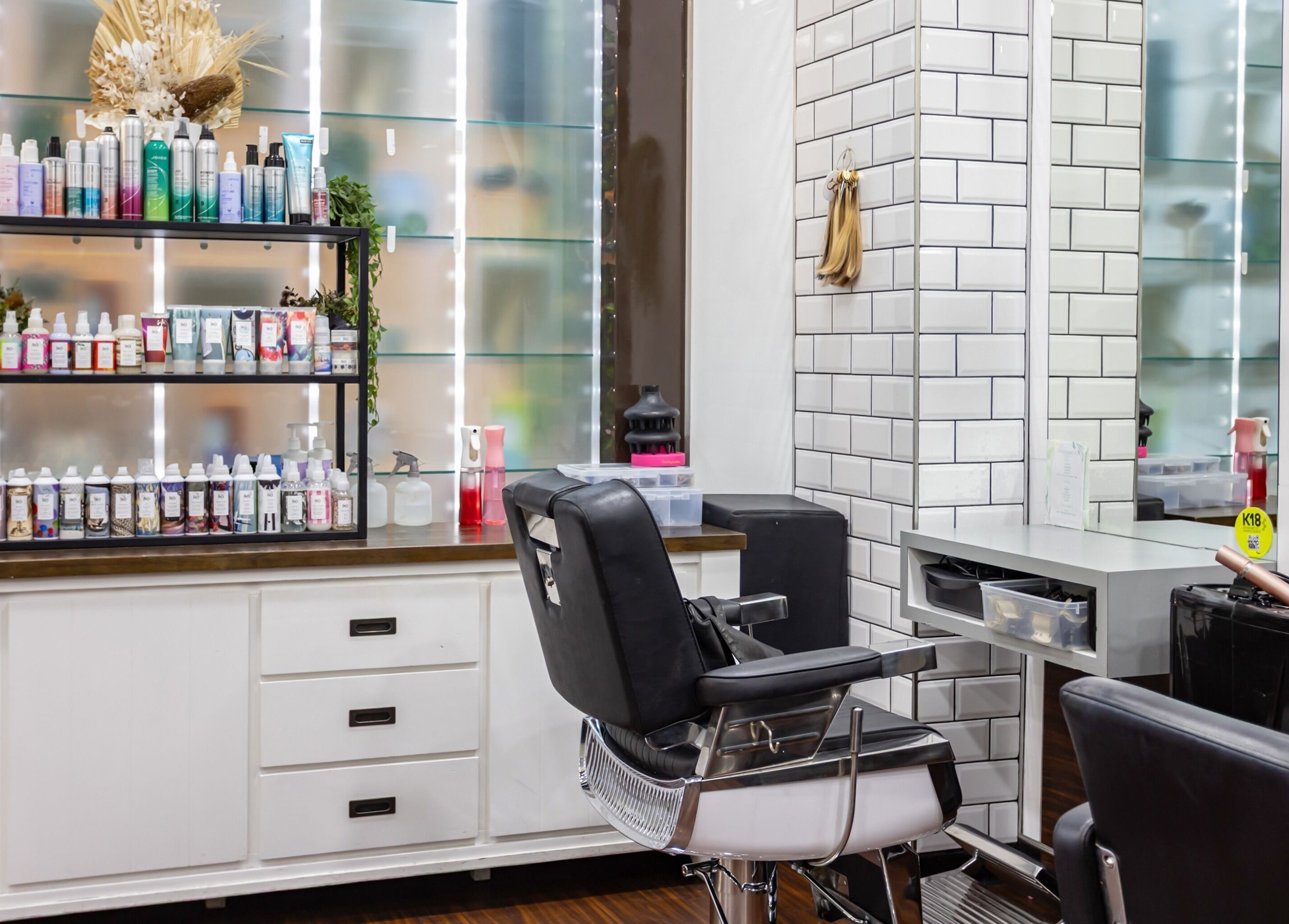 Modern hair styling chairs and products at Magnifique Salon, Springfield Central, Queensland, AU.