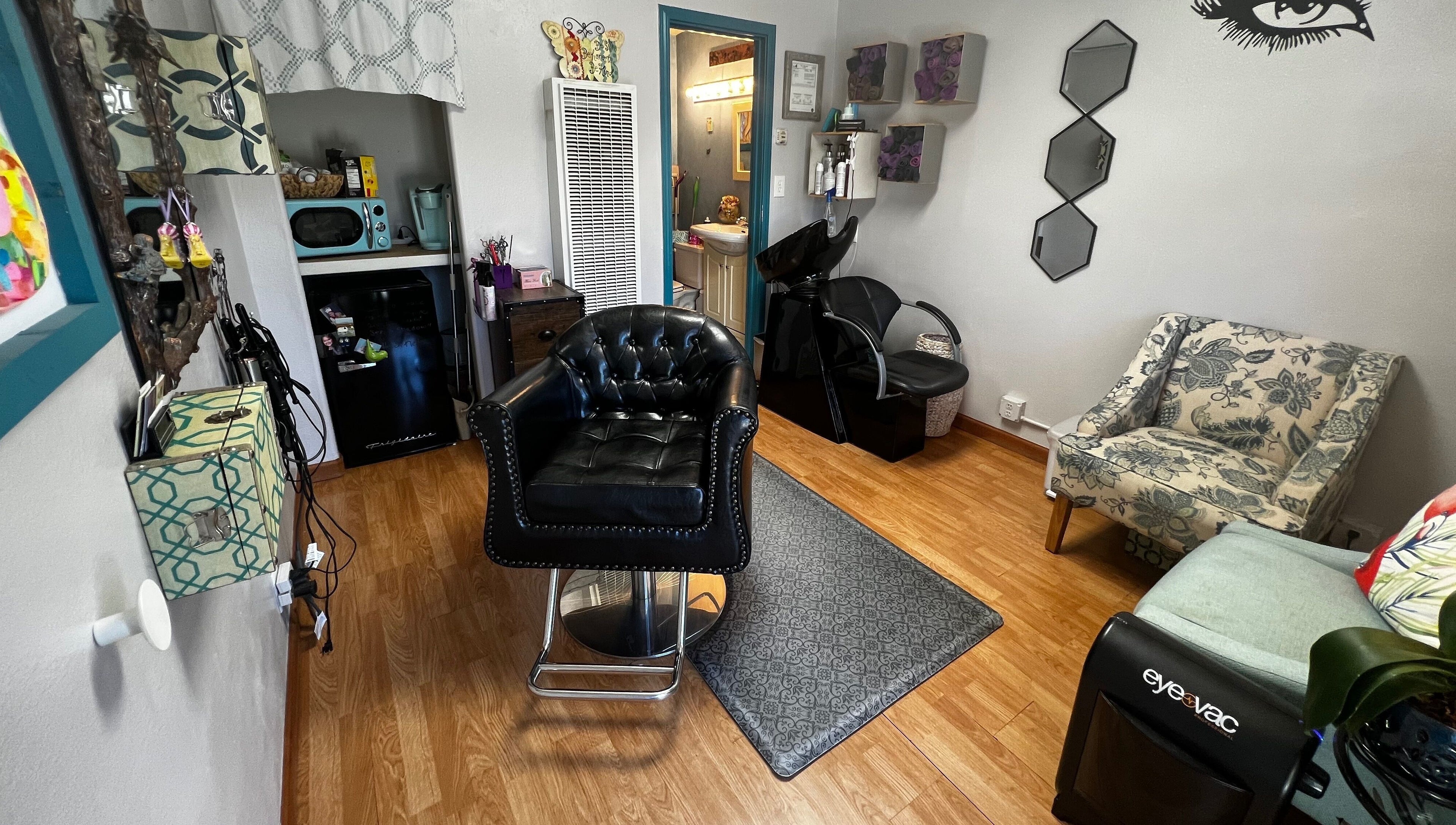 Shear Mischief cozy interior with stylish seating in Durango, Colorado, US.