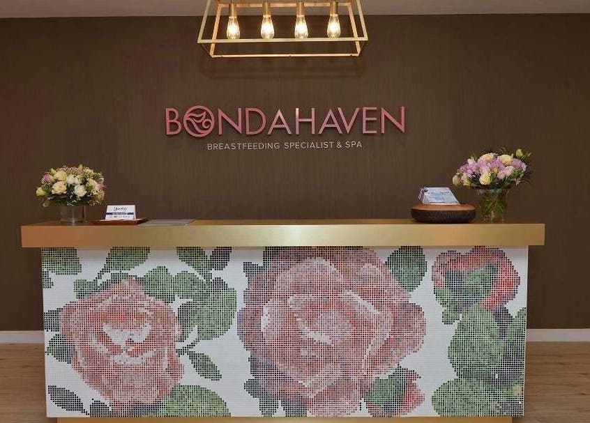 Elegant reception desk at Bondahaven Spa Bangi, Bandar Puteri Bangi, Selangor, MY, adorned with floral mosaic.