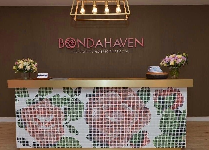 Elegant reception desk at Bondahaven Spa Bangi, Bandar Puteri Bangi, Selangor, MY, adorned with floral mosaic.