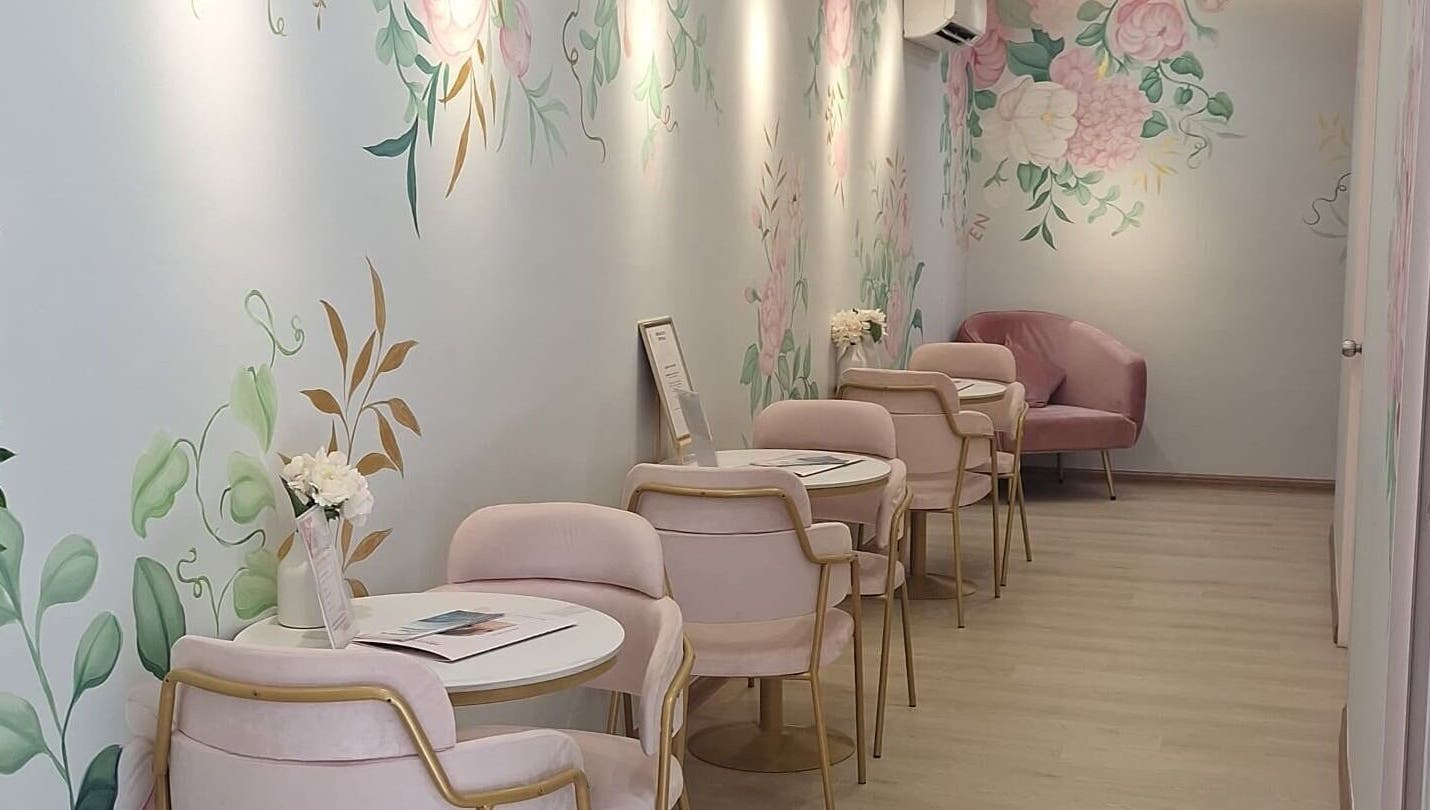 Chic pink lounge at Bondahaven Medicare Ampang in Ampang, Selangor, MY with floral walls and elegant chairs.