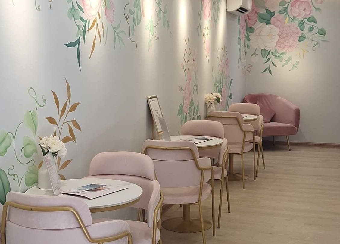 Chic pink lounge at Bondahaven Medicare Ampang in Ampang, Selangor, MY with floral walls and elegant chairs.