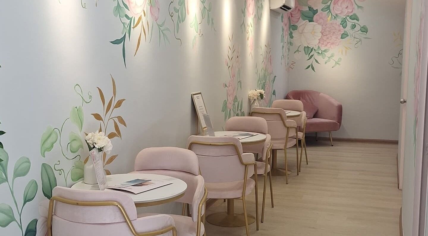 Chic pink lounge at Bondahaven Medicare Ampang in Ampang, Selangor, MY with floral walls and elegant chairs.