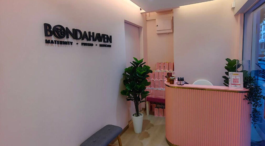 Reception at Bondahaven Medicare Ampang, a serene space in Ampang, Selangor, MY with pink decor and green plants.