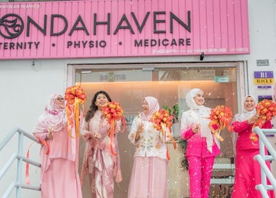 Opening ceremony at Bondahaven Medicare Ampang, Selangor, MY with women holding colorful ribbons.