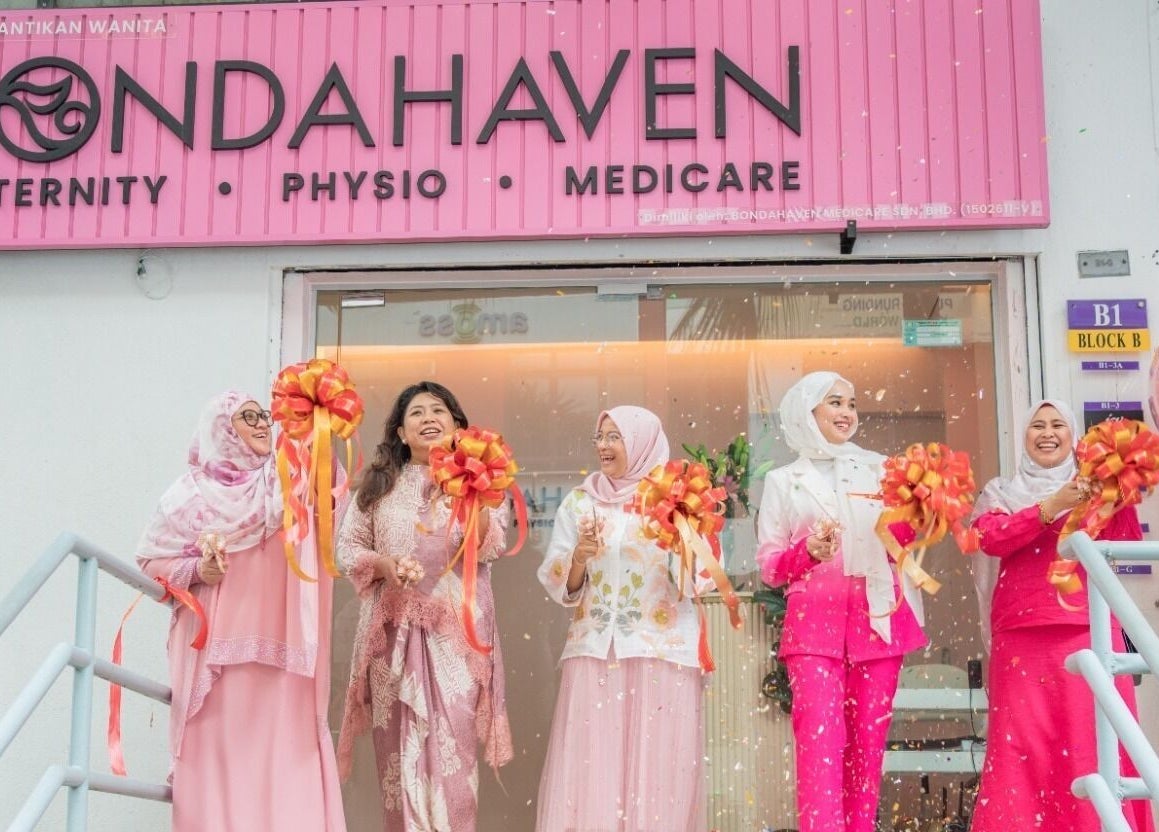 Opening ceremony at Bondahaven Medicare Ampang, Selangor, MY with women holding colorful ribbons.