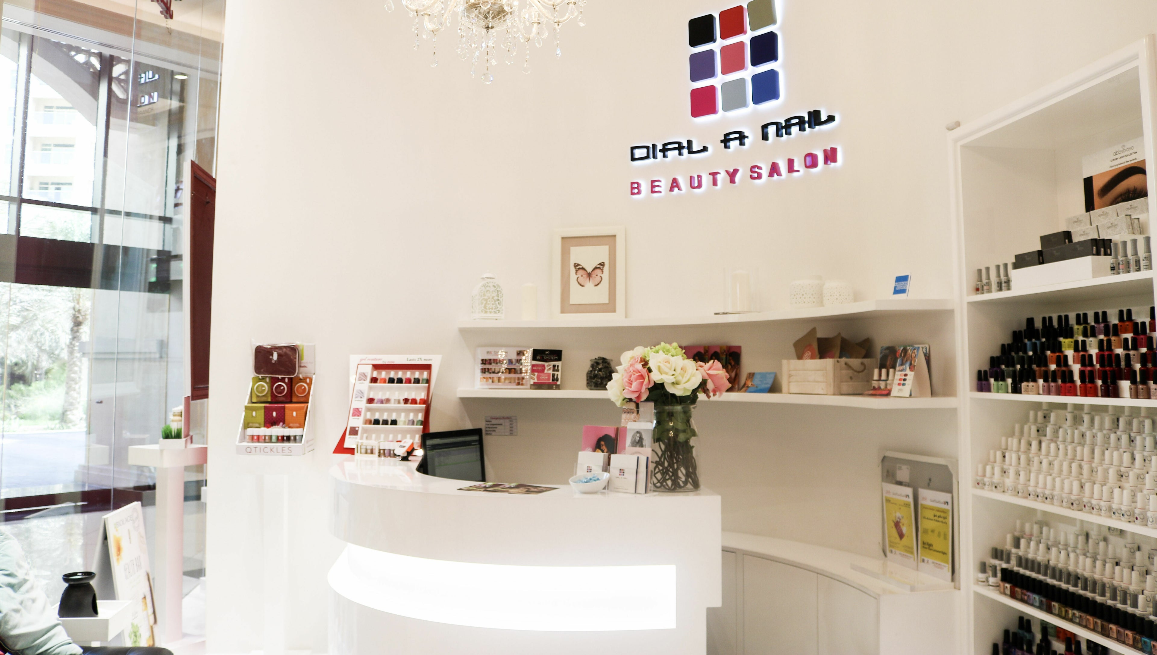 Elegant reception at Dial A Nail - Palm, Dubai, Dubai, AE showing polish display and chic decor.
