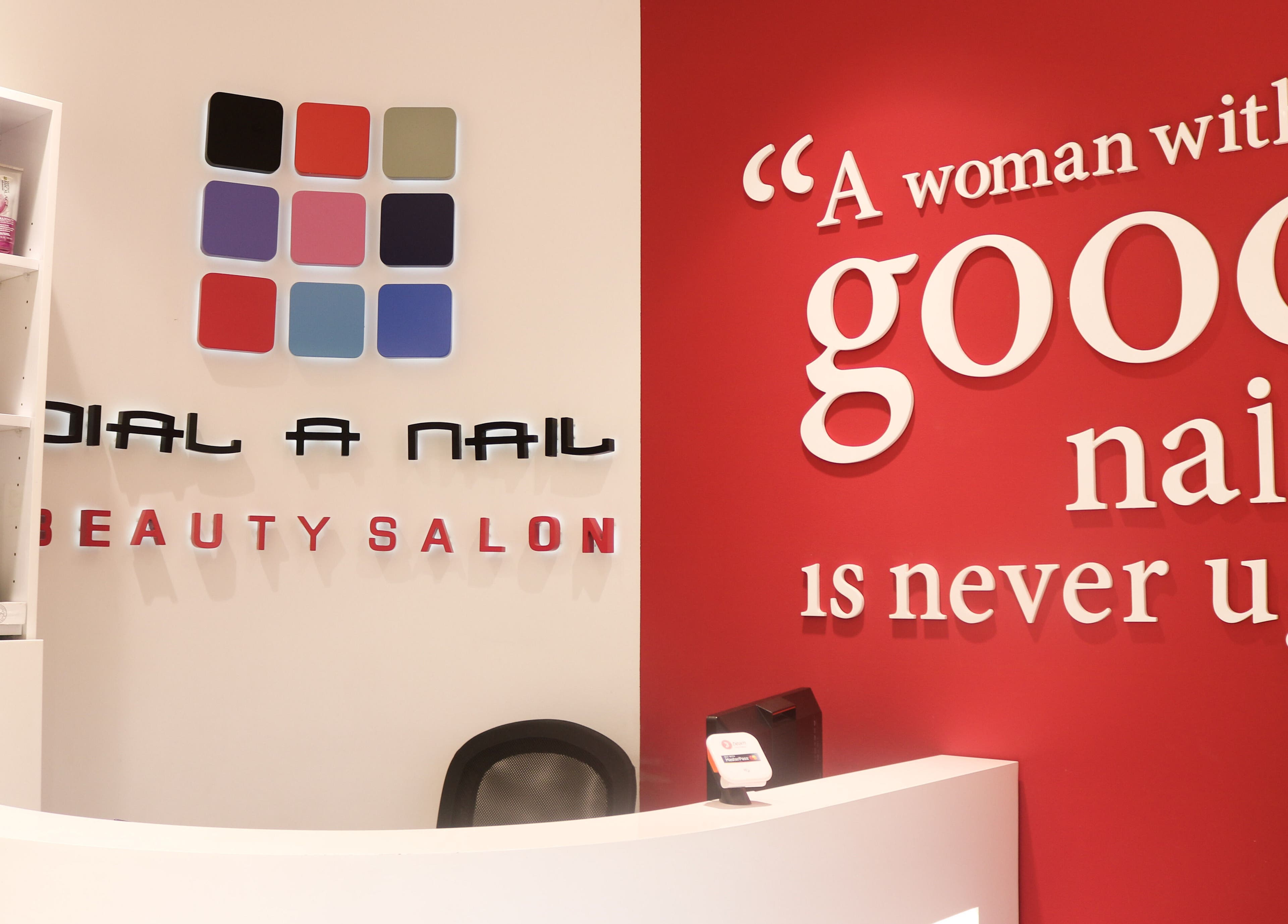 Reception area of Dial A Nail - Downtown, Dubai, Dubai, AE featuring salon branding and products.