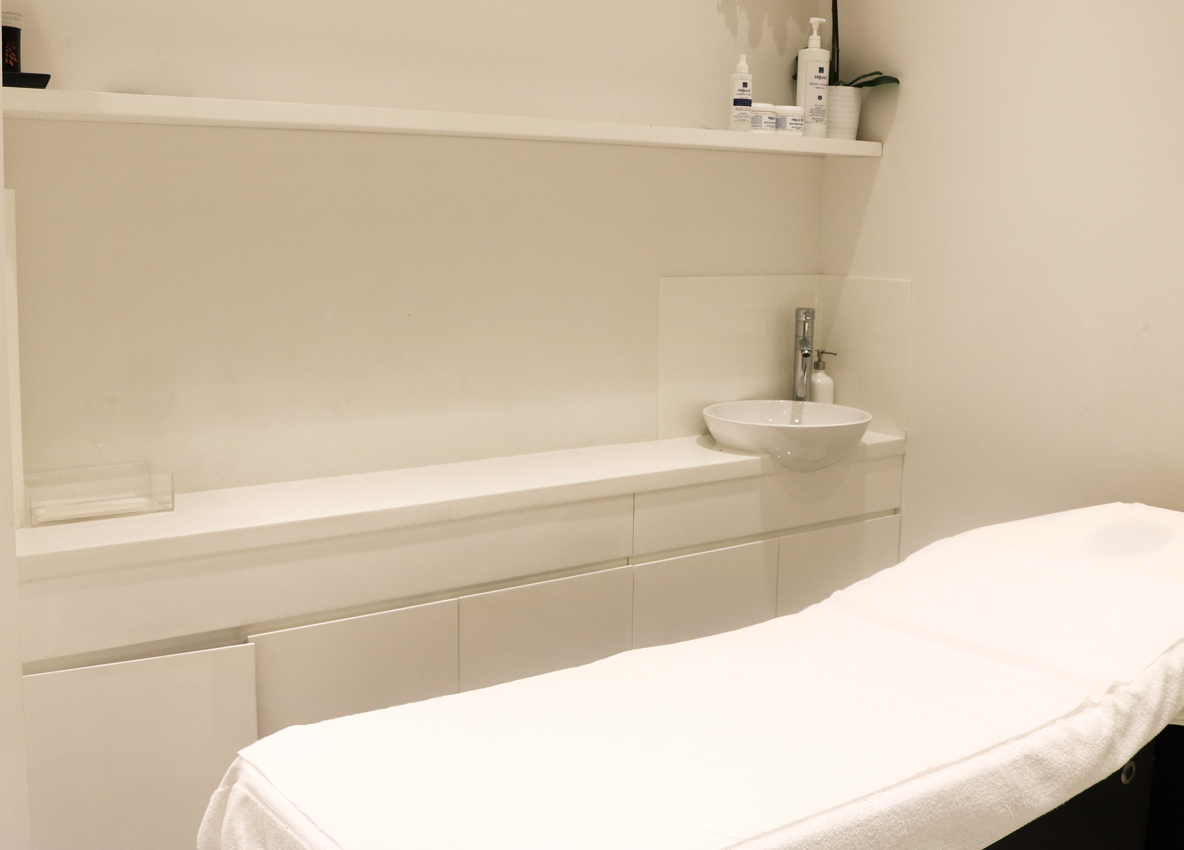 Relaxing treatment room at Dial A Nail - Downtown in Dubai, Dubai, AE, showcasing modern design.