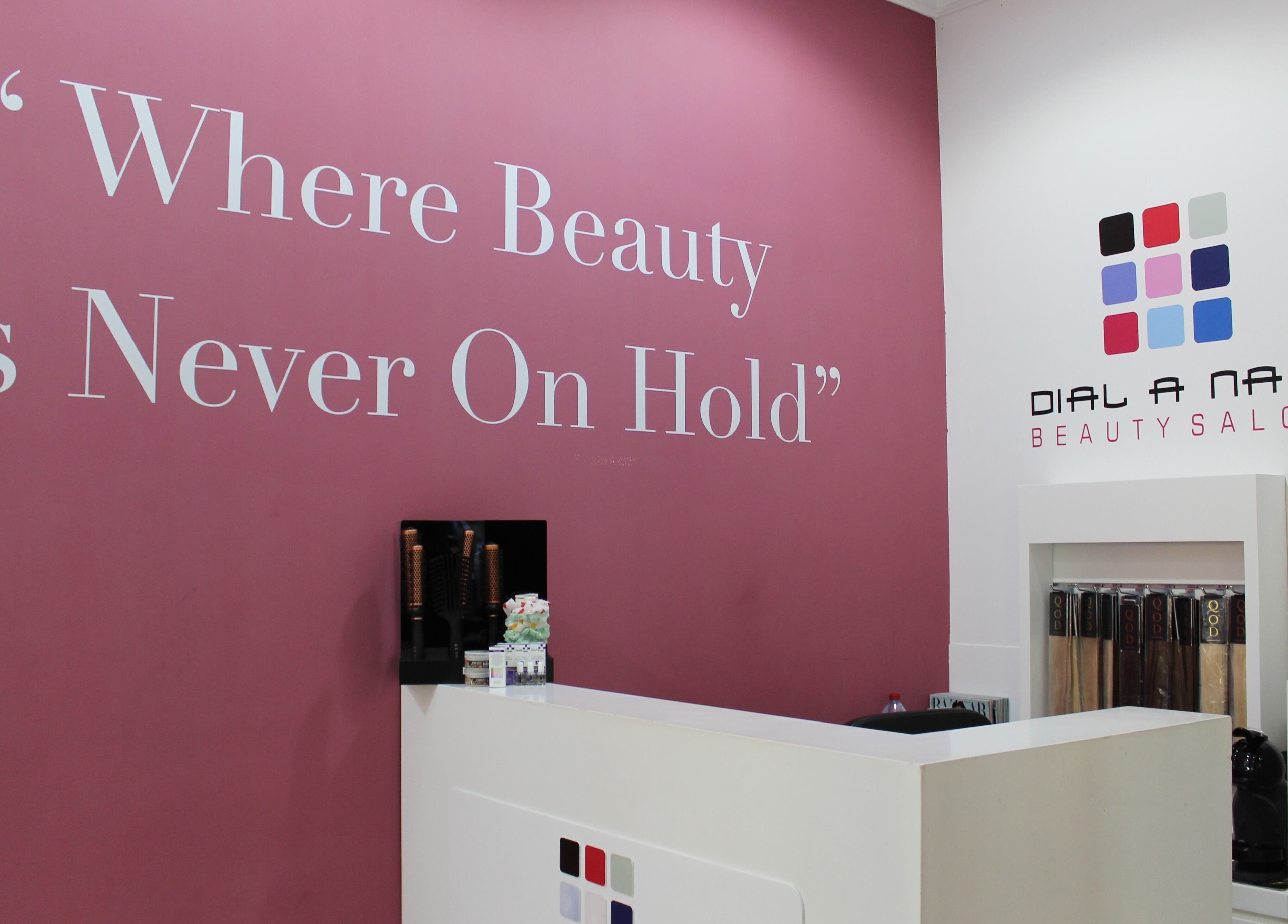Reception area at Dial A Nail - Boulevard, Dubai, AE with slogan 'Where Beauty Is Never On Hold'.