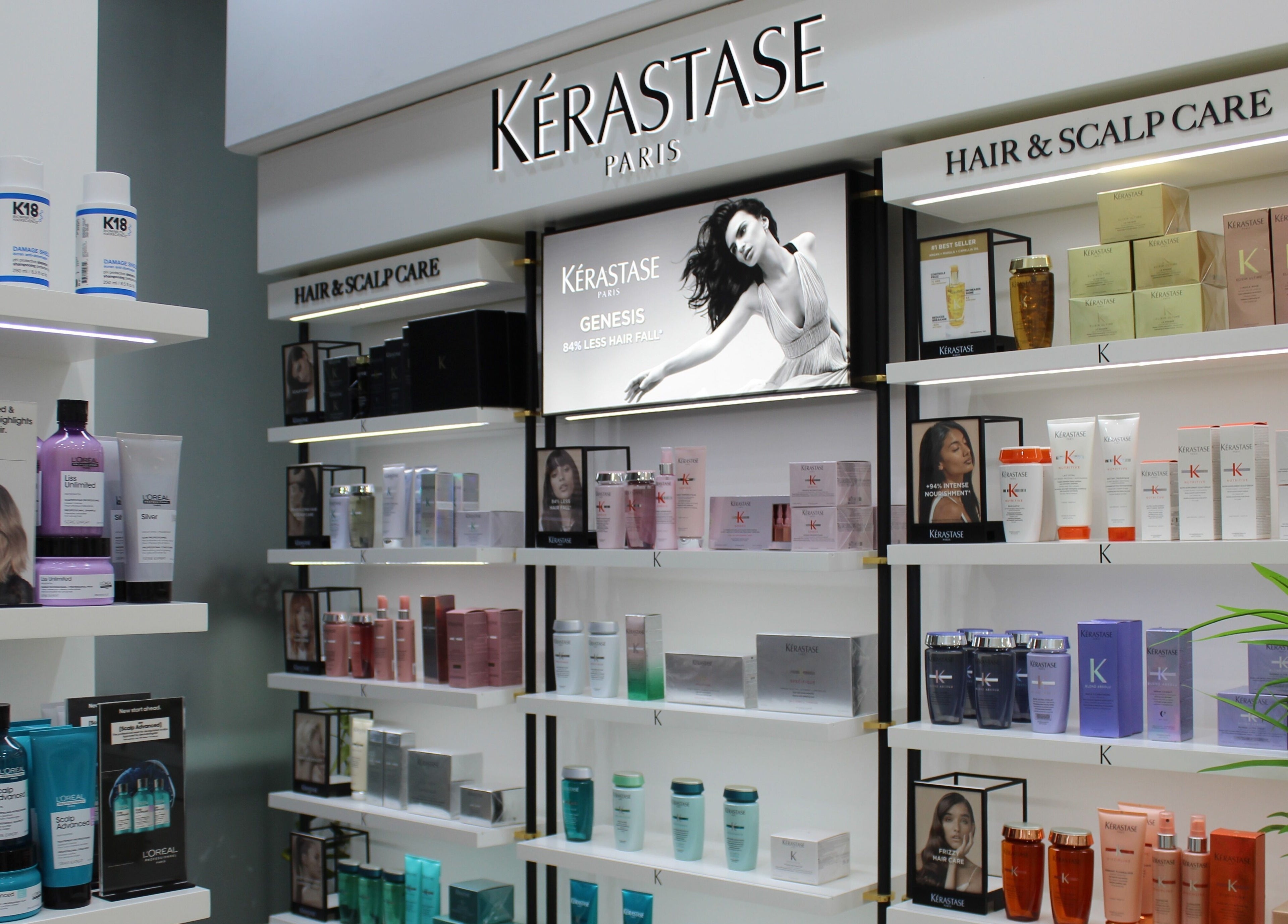 Kerastase hair products display at Dial A Nail - Boulevard in Dubai, AE, showcasing premium hair care items.