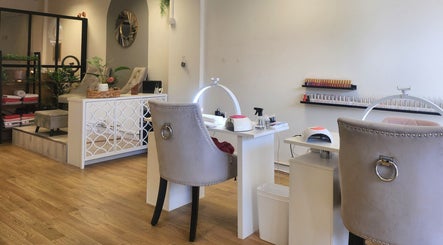 Modern nail salon interior at The Amber Boutique in Milford Haven, Wales, GB featuring stylish decor and manicure stations.