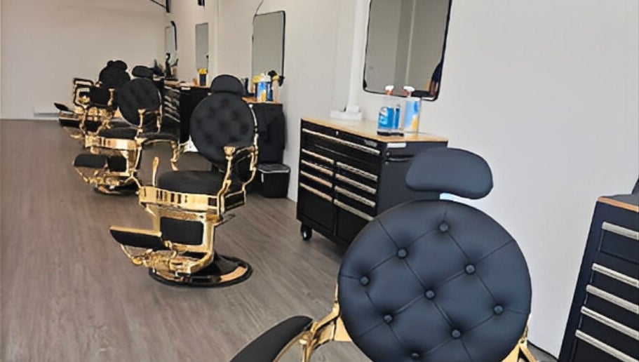 Elegant barber chairs at Master Cuts, Oshawa, Ontario, CA, showcasing modern luxury and comfort.