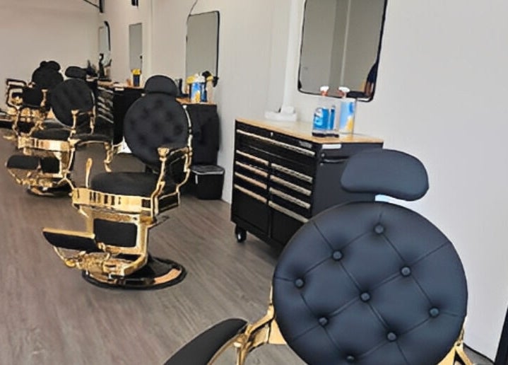 Elegant barber chairs at Master Cuts, Oshawa, Ontario, CA, showcasing modern luxury and comfort.
