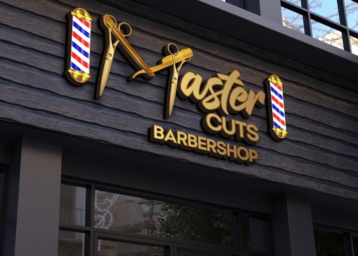 Master Cuts barbershop signage on stylish facade in Oshawa, Ontario, CA.