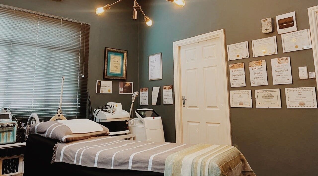 Elegantly designed therapy room at Zaks Wellness in Berea, Kwazulu-natal, ZA with certificates on the wall.