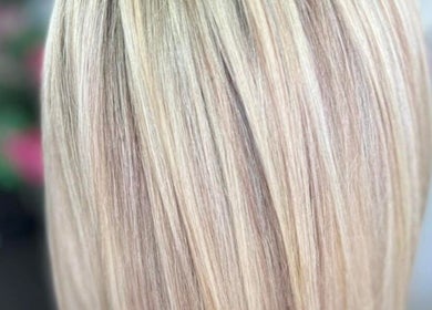 Elegant blonde hair styling at Mariska @ Salon Sjiek Boetiek, Cape Town, Western Cape, ZA.