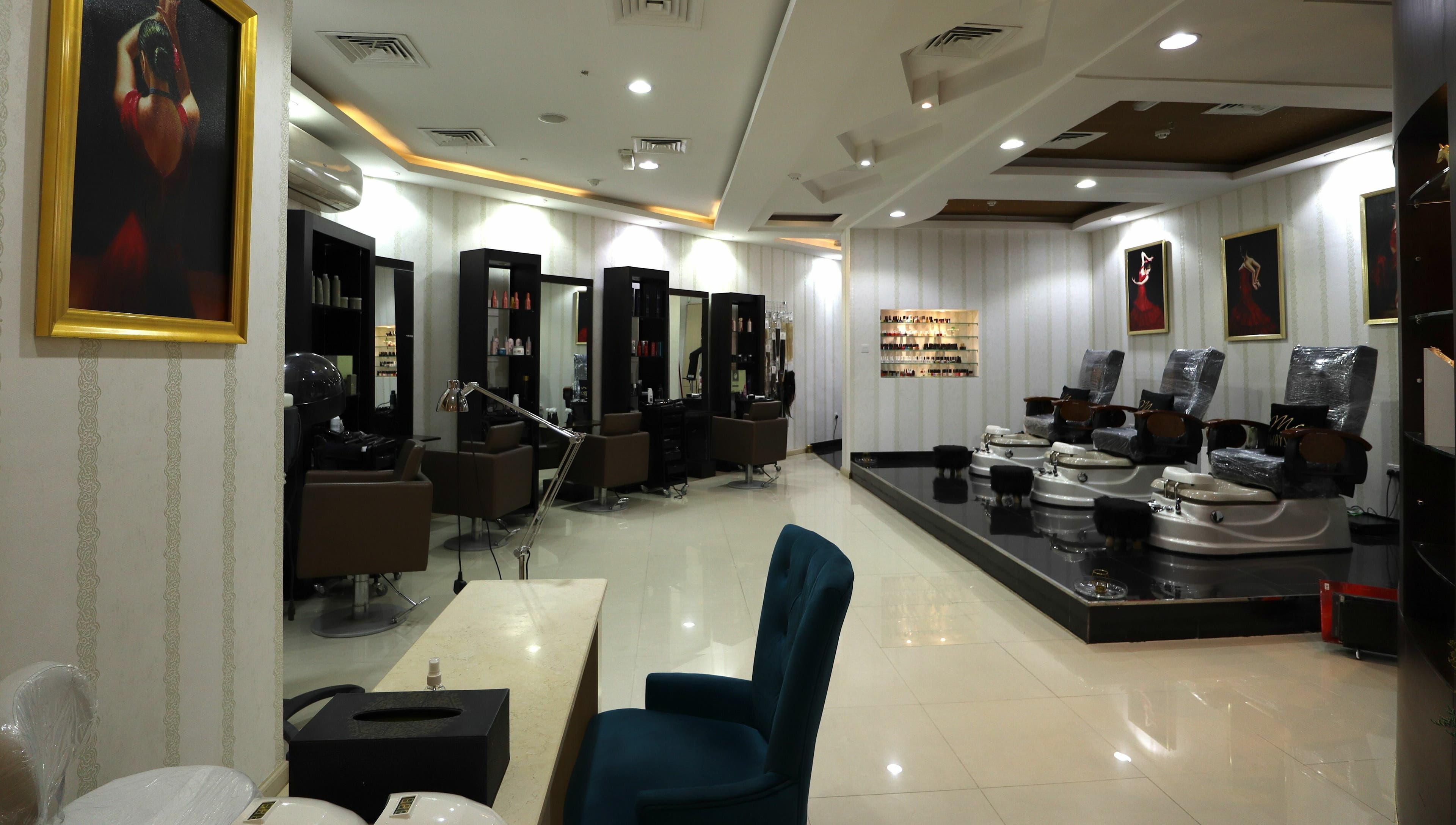 Interior of Vivian Beauty Center showcasing luxurious salon chairs and decor in دبي, دبي, AE.