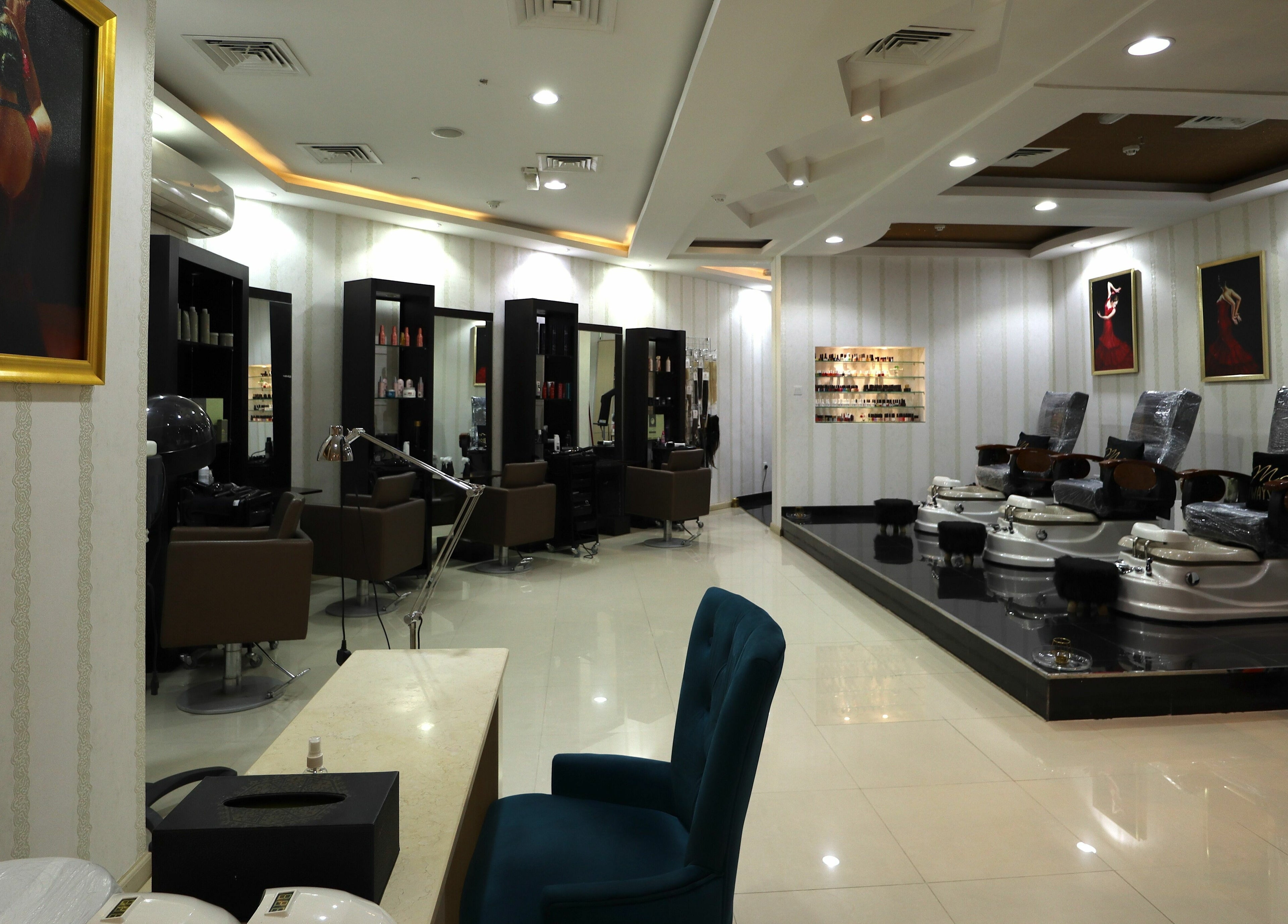 Interior of Vivian Beauty Center showcasing luxurious salon chairs and decor in دبي, دبي, AE.