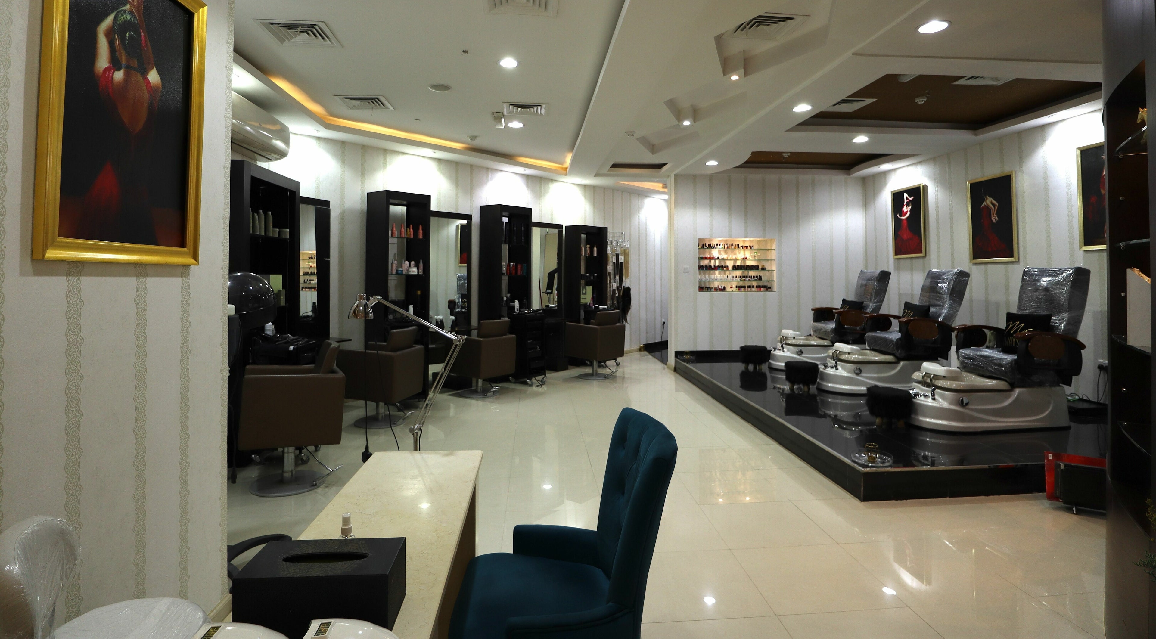 Interior of Vivian Beauty Center showcasing luxurious salon chairs and decor in دبي, دبي, AE.