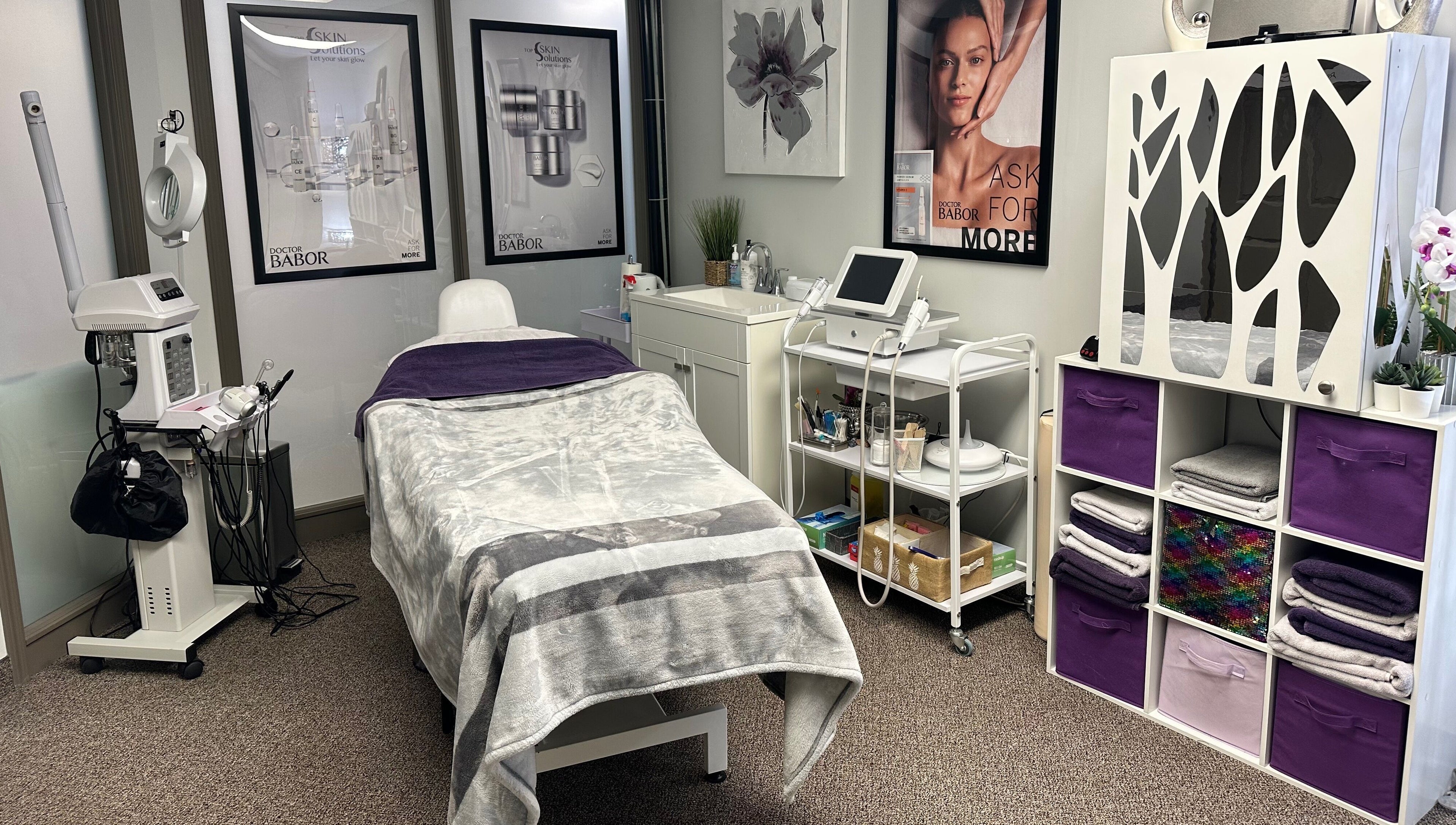 Cozy wellness treatment room at Top Skin Solutions, Sherwood Park, Alberta, CA, equipped with modern beauty devices.