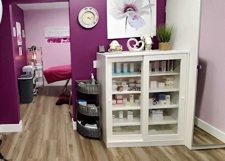 Elegant treatment room at Top Skin Solutions, Sherwood Park, Alberta, CA with modern decor and skincare products.