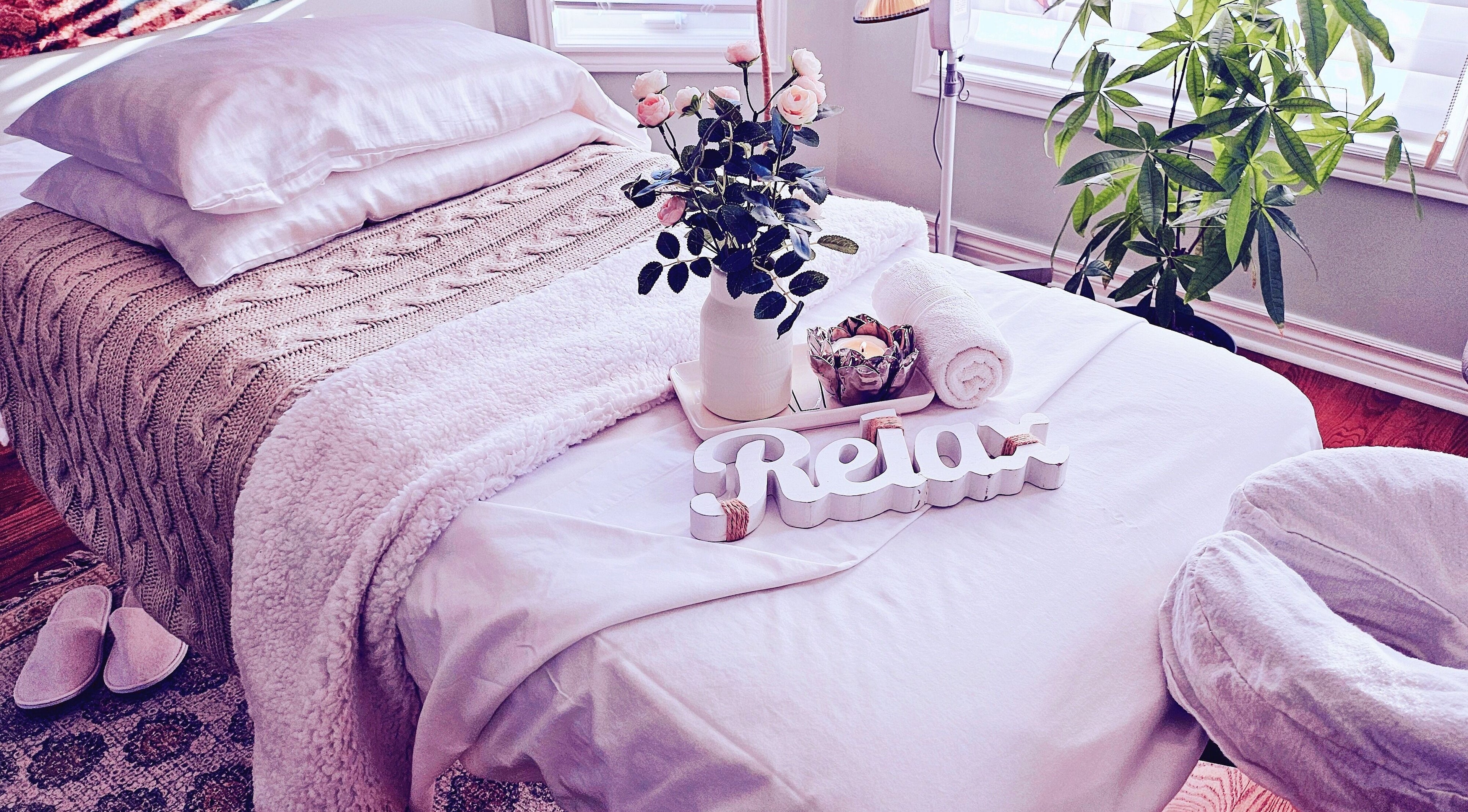 Cozy massage room at Haiyan Cai, RMT in Cambridge, Ontario, CA, with relaxation decor and soft linens.