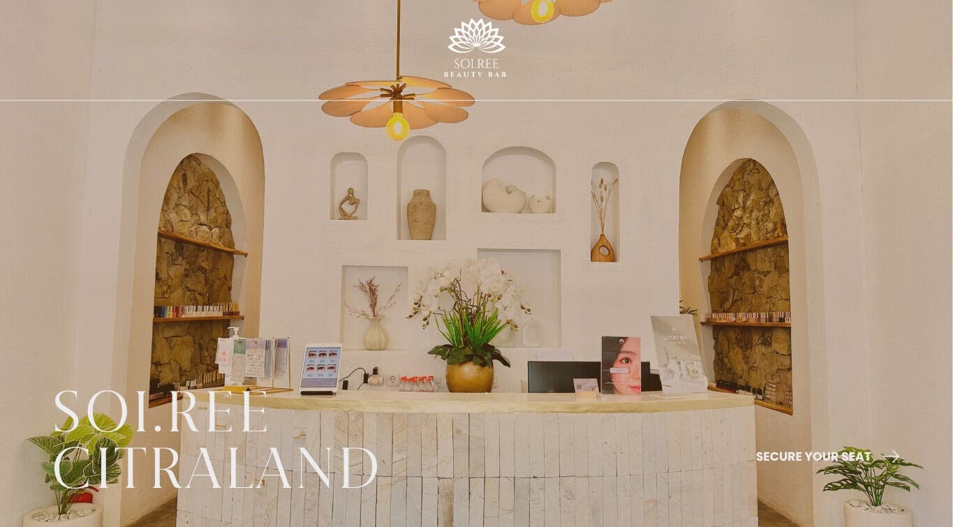 Chic reception at SoiRee Citraland, East Java, East Java, ID with a modern aesthetic and floral accents.