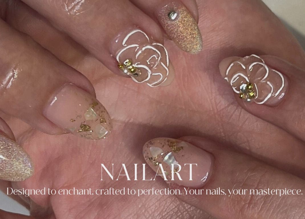 Intricate nail art design at SoiRee Ciputra World, Jawa Timur, ID showcasing delicate floral patterns.