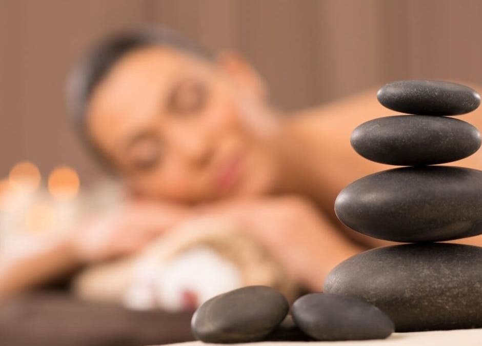 Massage stones at Harmony Massage Bothell, Bothell, Washington, US, evoke relaxation and tranquility.