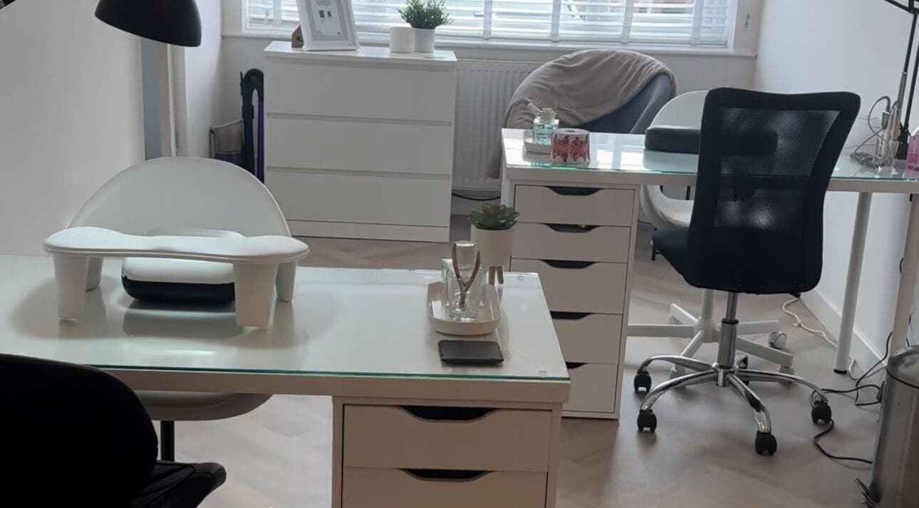 Modern nail care setup at The Beauty Lounge, Falmouth, England, GB with sleek design and bright ambience.