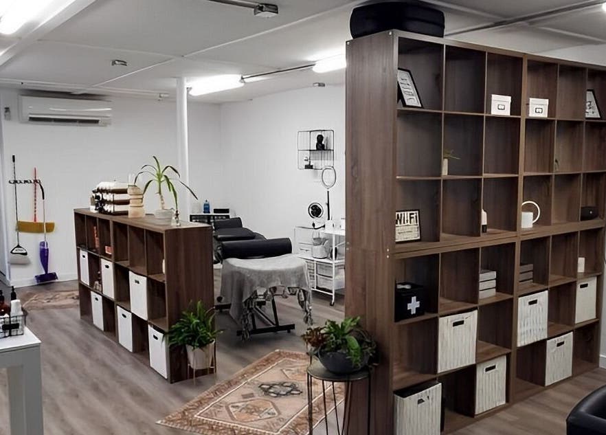 Modern interior of Mav & Harp Co Salon in Selinsgrove, Pennsylvania, US, featuring stylish decor and treatment areas.