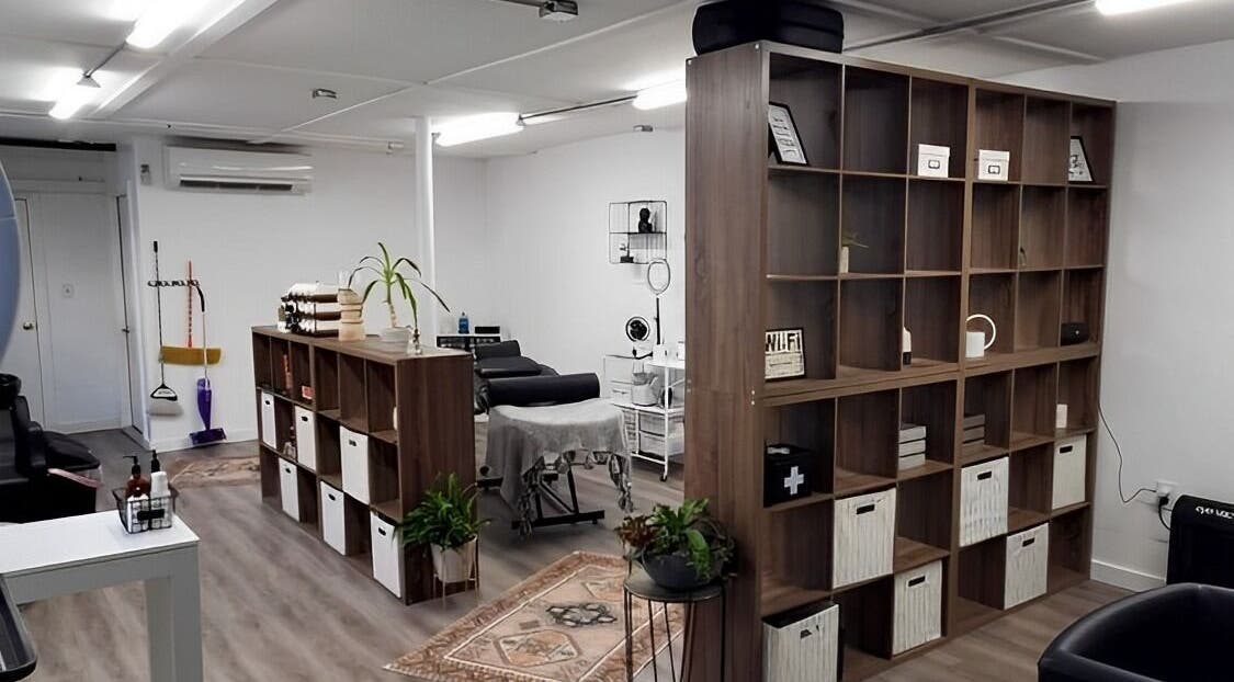 Modern interior of Mav & Harp Co Salon in Selinsgrove, Pennsylvania, US, featuring stylish decor and treatment areas.