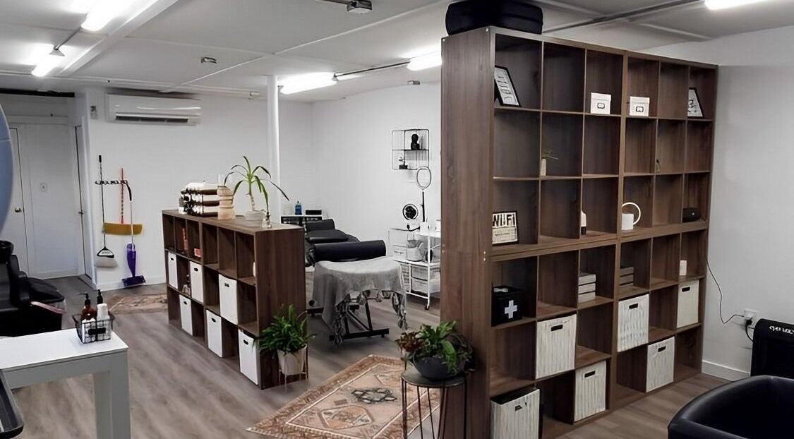 Modern interior of Mav & Harp Co Salon in Selinsgrove, Pennsylvania, US, featuring stylish decor and treatment areas.