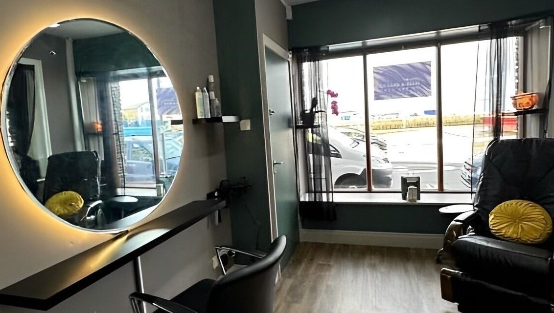 Cozy salon interior with mirrors and chairs at Beauty By The Quay, Ramsey, Isle of Man, IM.
