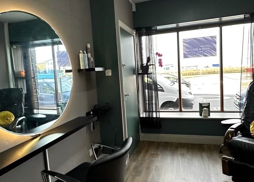 Cozy salon interior with mirrors and chairs at Beauty By The Quay, Ramsey, Isle of Man, IM.