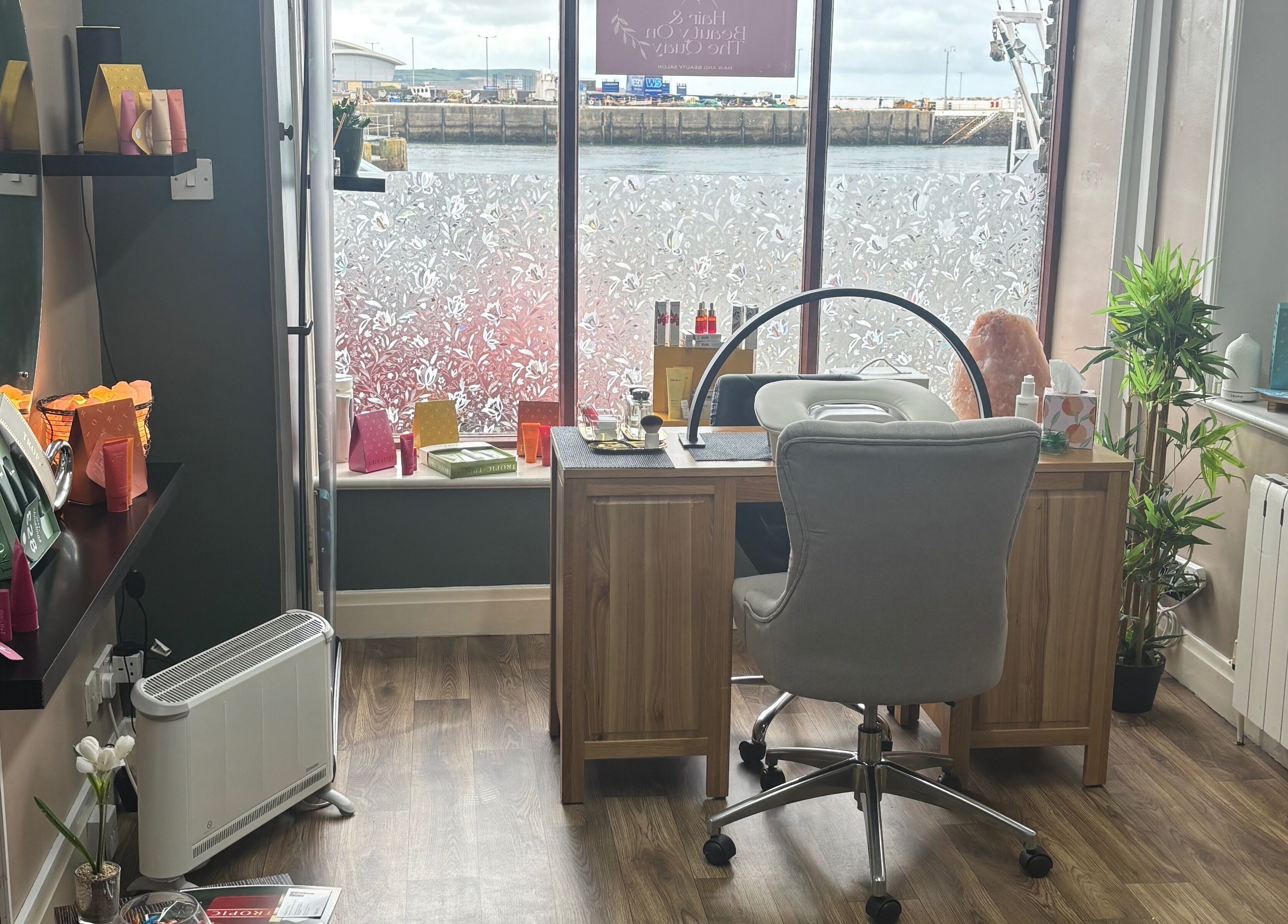 Cozy nail station at Beauty By The Quay, Ramsey, Isle of Man, IM overlooking a scenic view.
