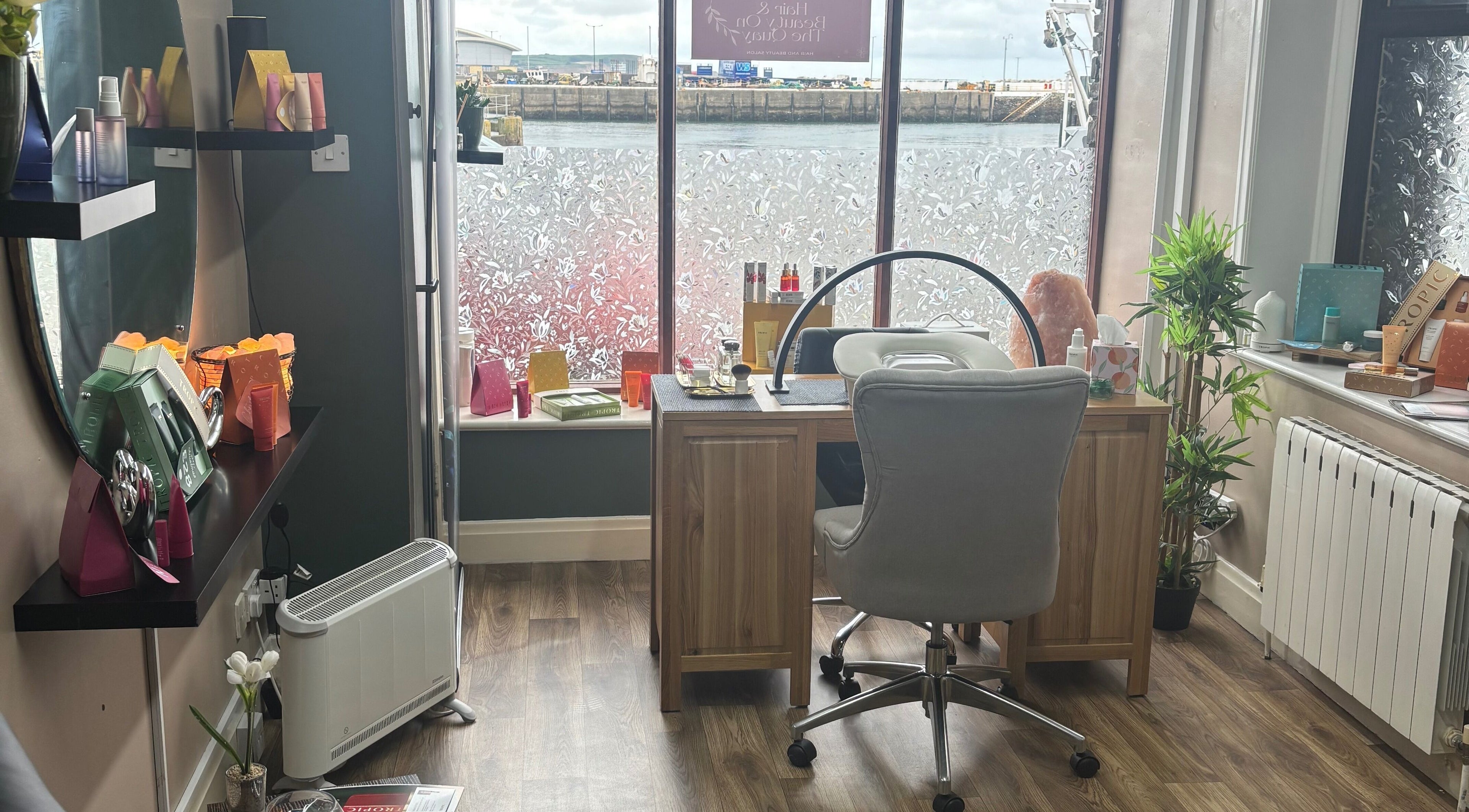 Cozy nail station at Beauty By The Quay, Ramsey, Isle of Man, IM overlooking a scenic view.