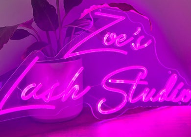 Vibrant neon sign of Zoe’s Lash Studio in St Albans Park, Victoria, AU with pink lighting.