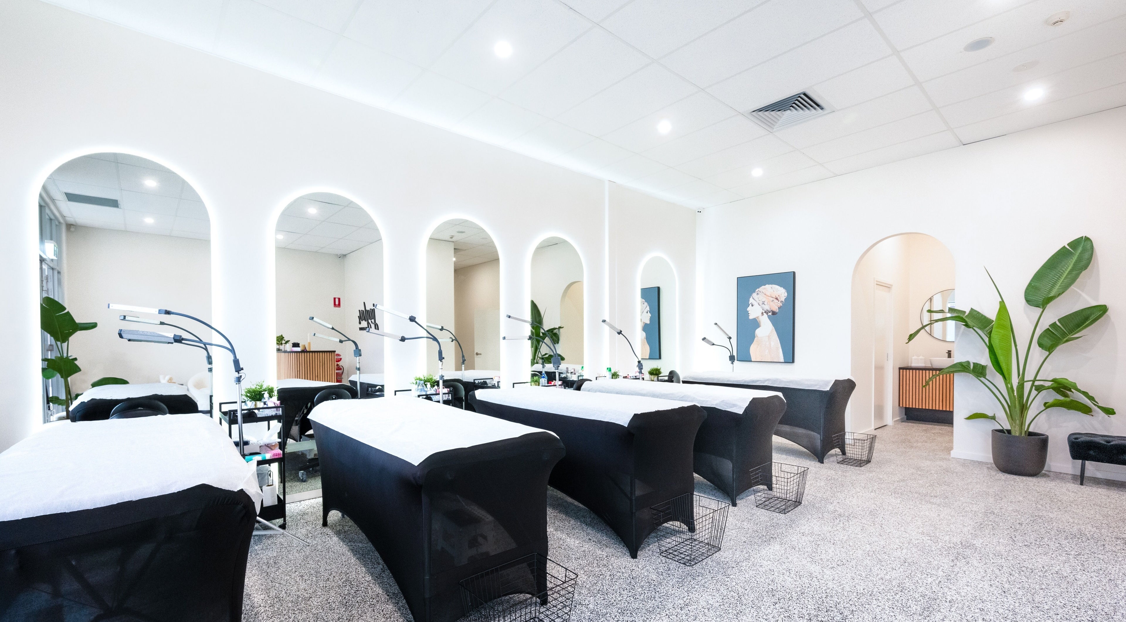 Bright treatment room at Jayla's Beauty Salon in Melbourne, Victoria, AU featuring modern decor and cozy beds.