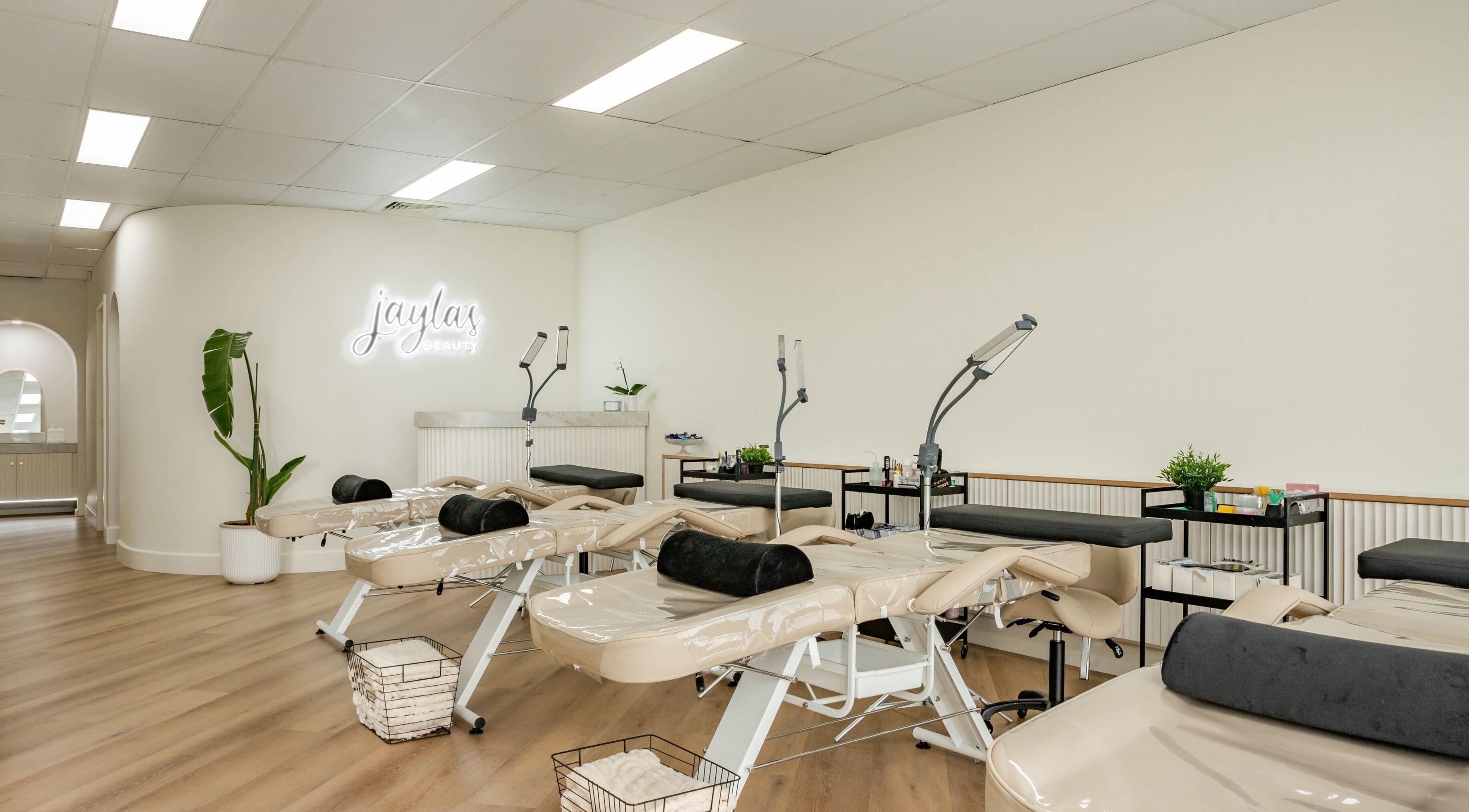 Luxurious treatment room at Jayla's Beauty Salon, Melbourne, Victoria, AU with comfortable beds and modern decor.